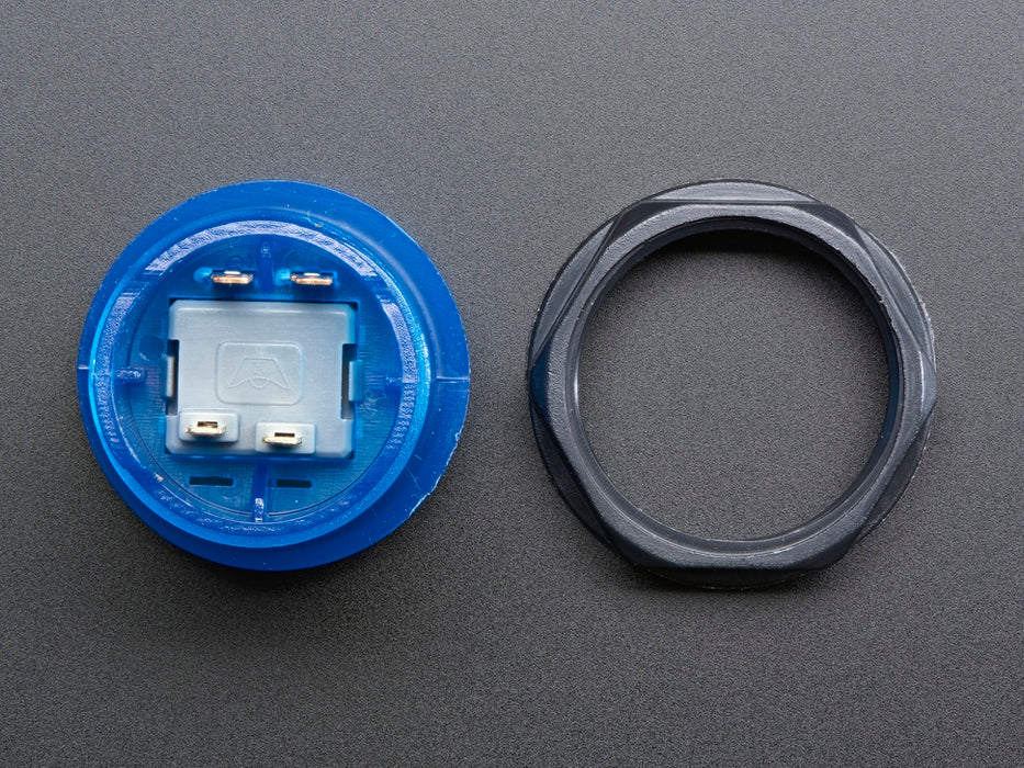 Video of 30mm translucent blue LED arcade button flashing on and off.