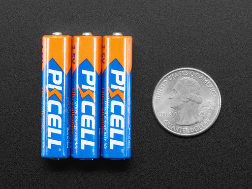 Angled shot of 3 PKcell AAA batteries. 