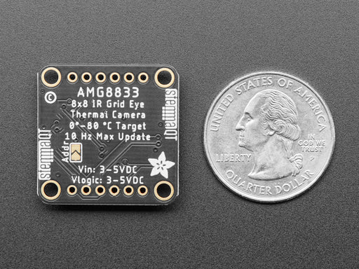 Video of a hand making bunny ears with their fingers over the AMG8833 IR thermal sensor. A thermal image readout displays on a TFT screen wired into a breadboard.