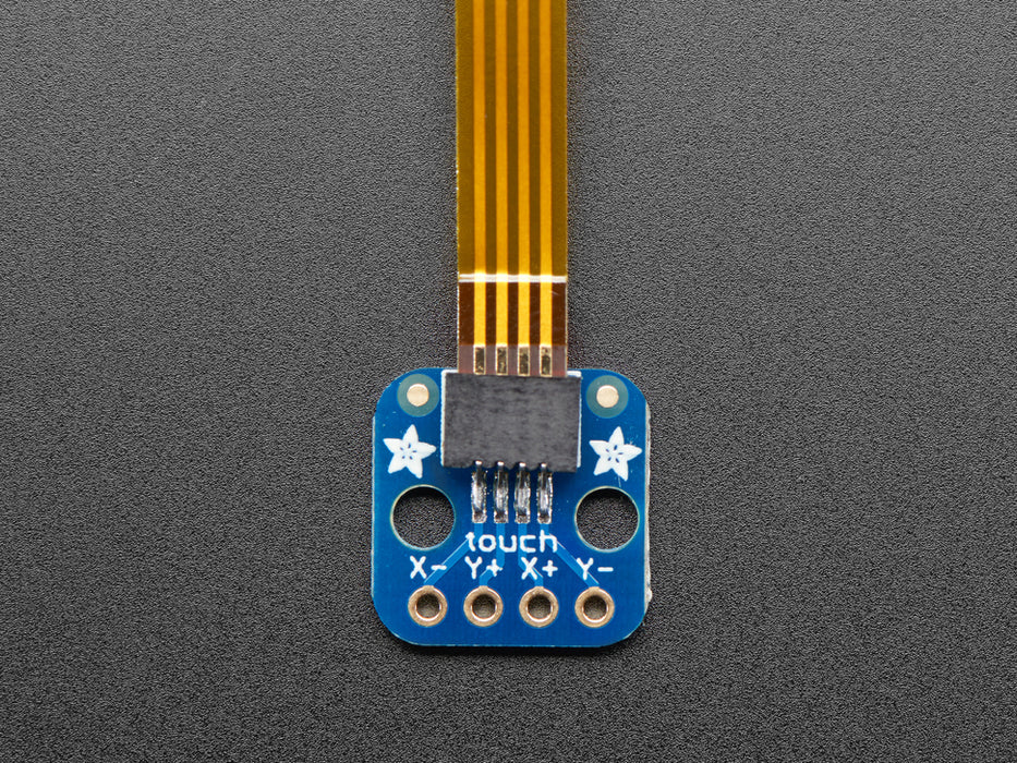 Angled shot of a small touchscreen breakout board.