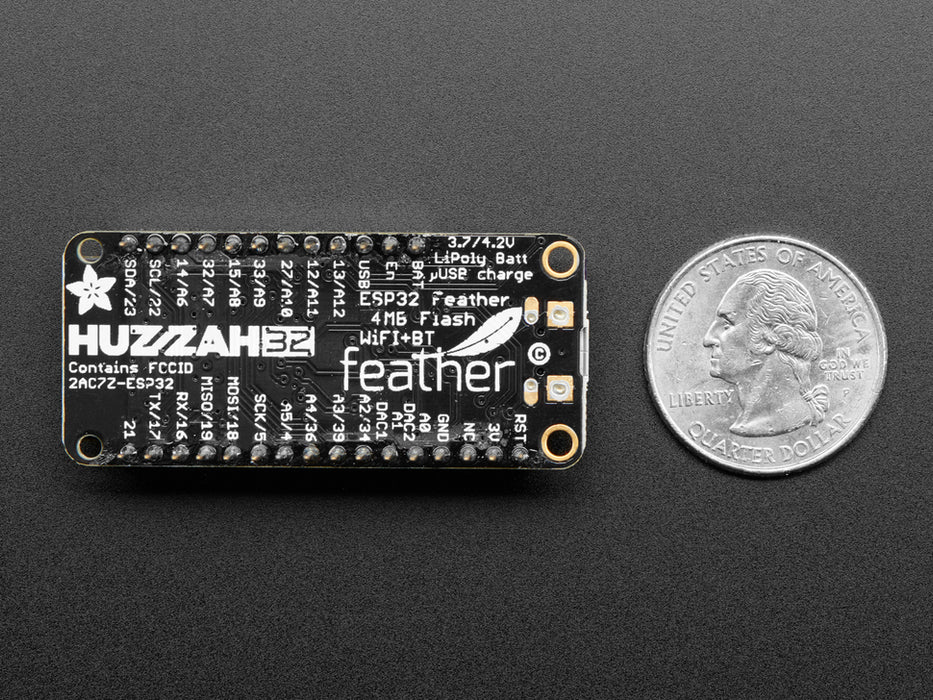 Angled shot of an Assembled Adafruit HUZZAH32 – ESP32 Feather Board - with Stacking Headers