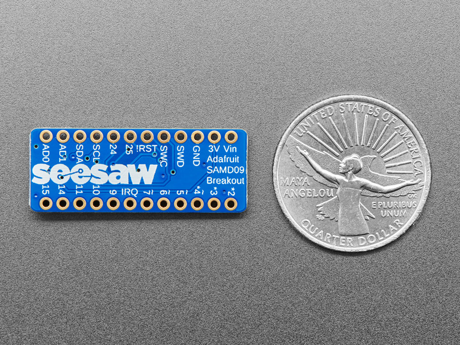 Angled shot of a Adafruit ATSAMD09 Breakout with seesaw. 