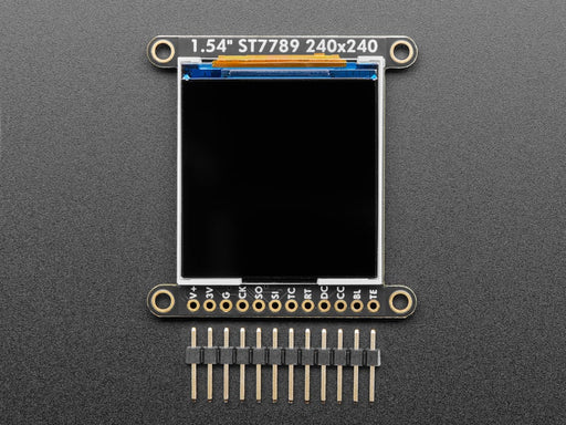 Overhead video of OLED breakout wired up on breadboard to QT Py and BFF driver board. Video displays multi-colored shapes and animations.