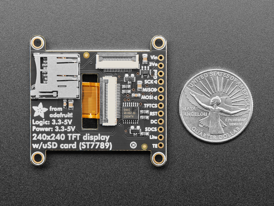 Overhead video of OLED breakout wired up on breadboard to QT Py and BFF driver board. Video displays multi-colored shapes and animations.