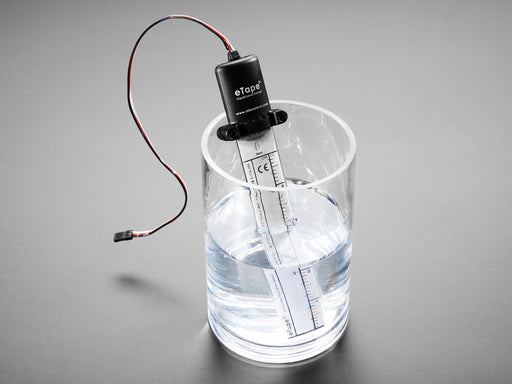  Liquid Level Sensor with Plastic Casing inserted into glass with water