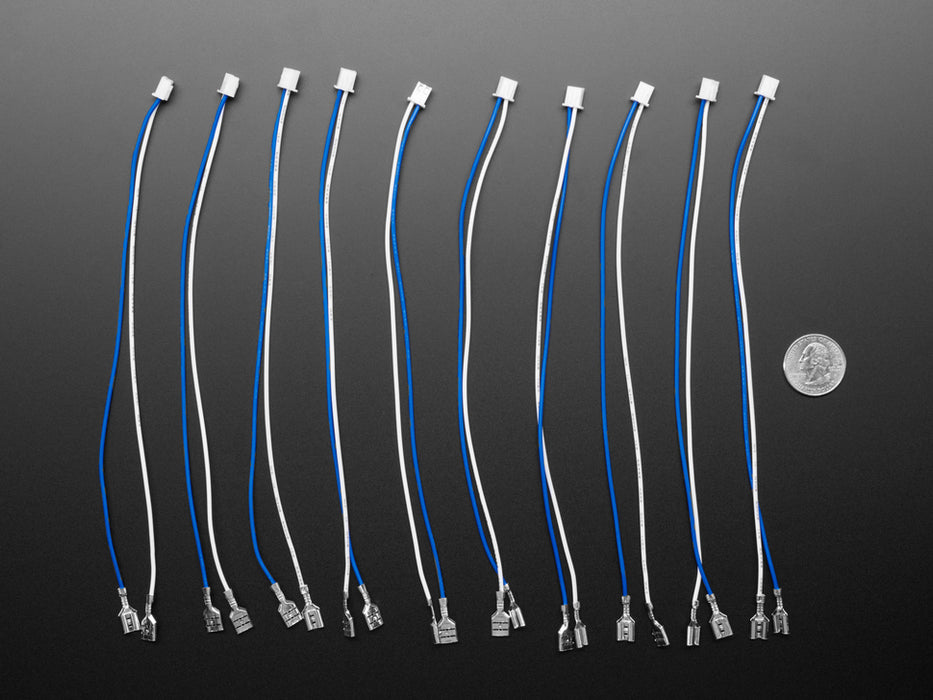 Angled shot of ten ~8.5" long quick-connect wire pairs in white and blue. 