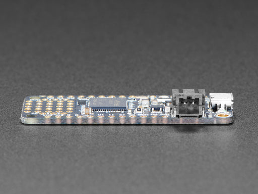 Angled shot of a Adafruit Feather M4 Express. 