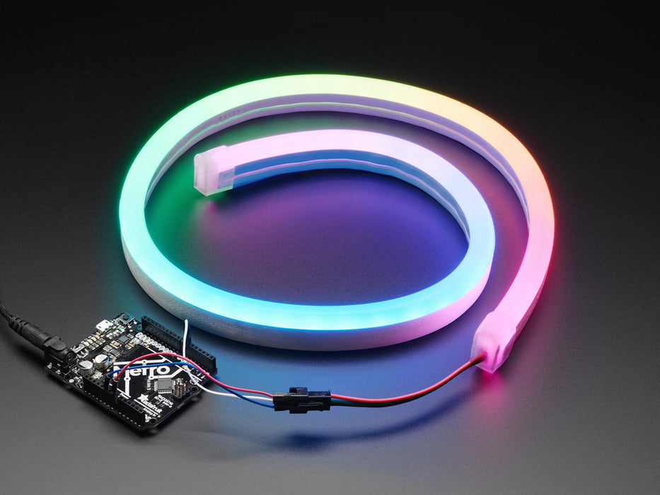 Hand flexing NeoPixel RGB Neon-like LED Flex Strip with Silicone Tube