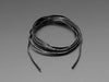 A coiled Silicone Cover Stranded-Core Ribbon Cable - 4 Wires 1 Meter Long