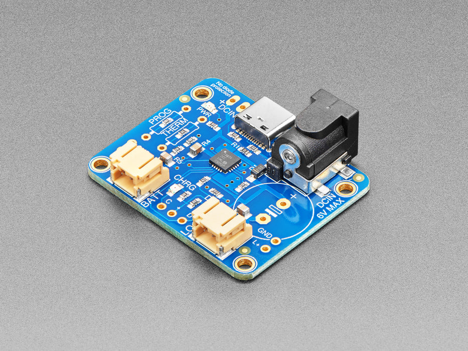 USB / DC / Solar Lithium Ion/Polymer charger connected to a lithium battery thought a 2-pin JST cable and the solar panel into the DC jack using a 2.1mm adapter cable.