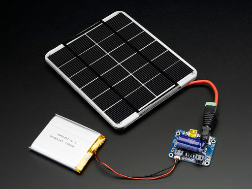 USB / DC / Solar Lithium Ion/Polymer charger connected to a lithium battery thought a 2-pin JST cable and the solar panel into the DC jack using a 2.1mm adapter cable.