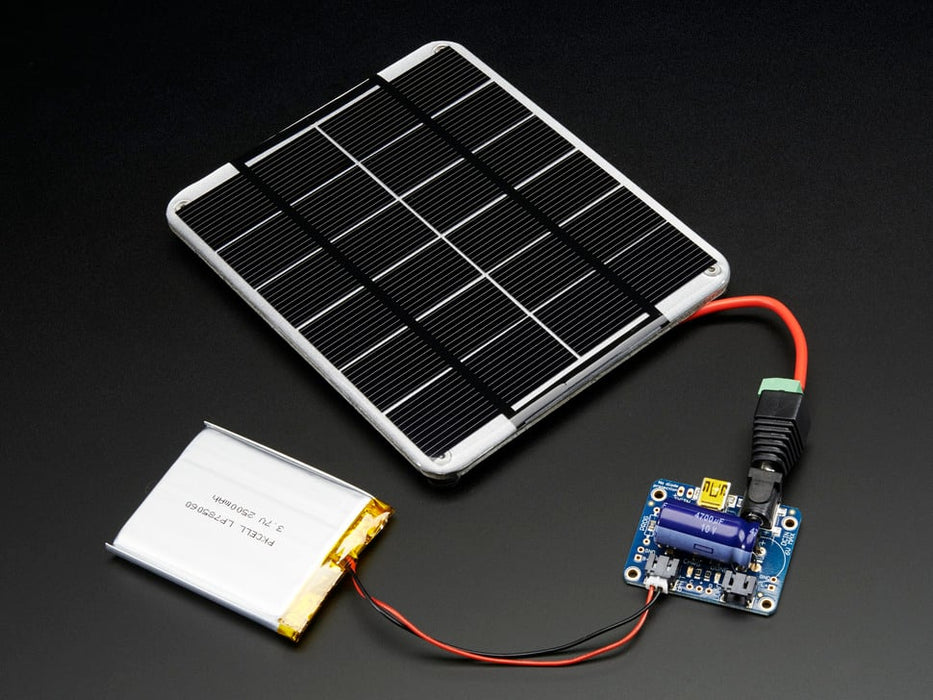 USB / DC / Solar Lithium Ion/Polymer charger connected to a lithium battery thought a 2-pin JST cable and the solar panel into the DC jack using a 2.1mm adapter cable.