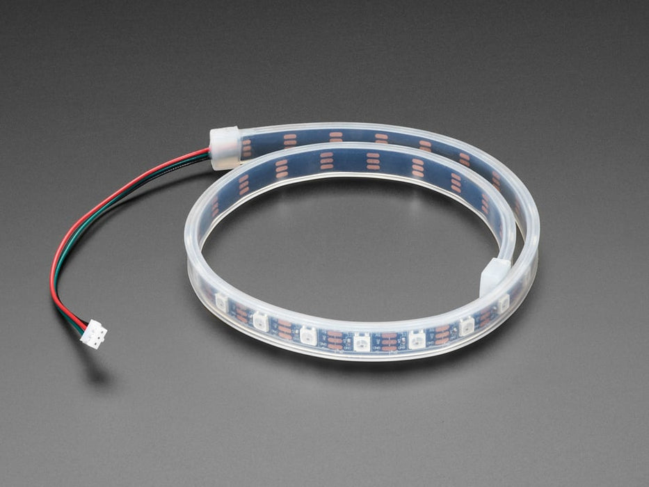 Adafruit NeoPixel LED Strip with 3-pin JST PH Connector lit up rainbow