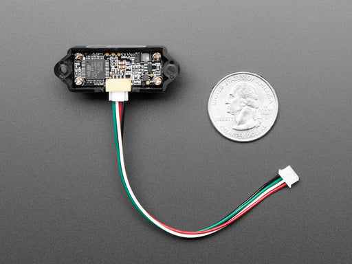 Angled shot of a TFmini Infrared Time of Flight Distance Sensor connected to a JST PH 2mm 4-Pin to Male Header Cable.