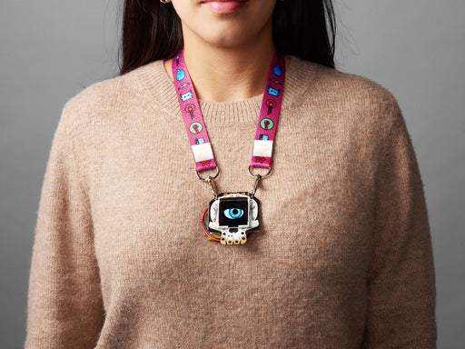 Pink lanyard with Adafruit characters and metal hooks at ends