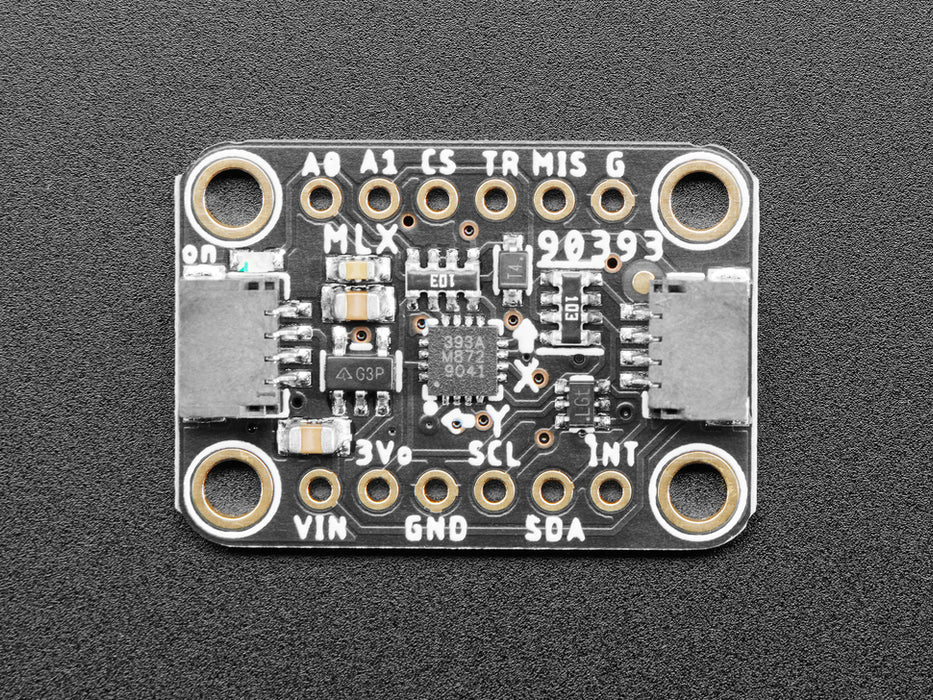 Video of a white hand with purple polished nails moving a battery above a Adafruit Wide-Range Triple-axis Magnetometer. 