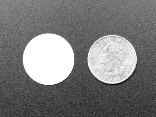 White disc next to quarter