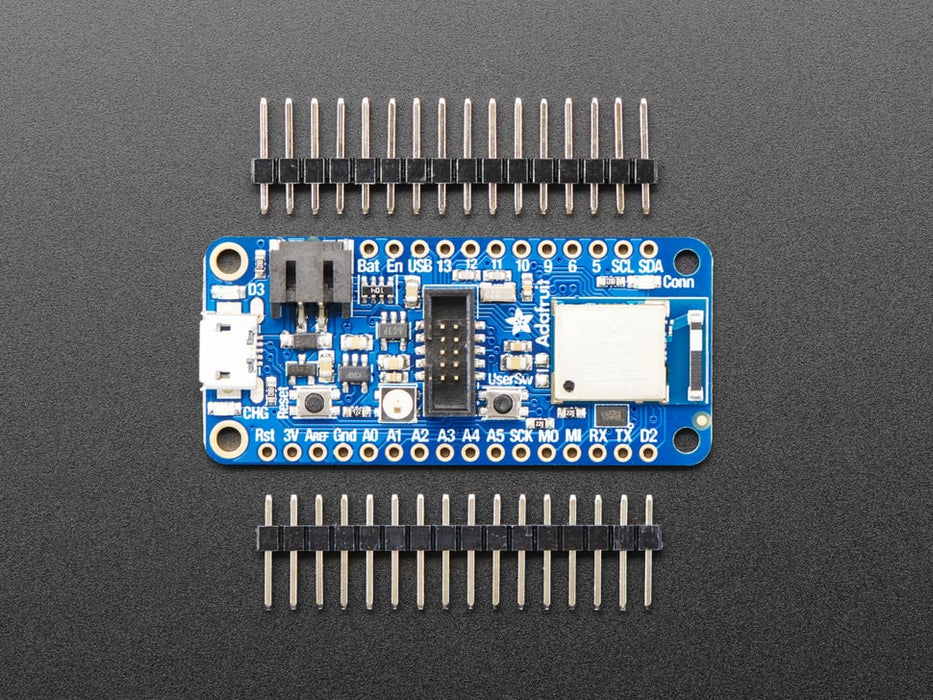 Angled shot of a Adafruit Feather nRF52840 Express. 