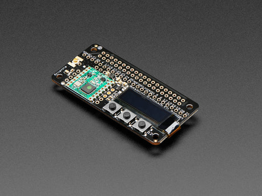 A rectangular microcontroller with OLED screen. A peach-manicured index finger presses buttons below the OLED screen, triggering different texts.