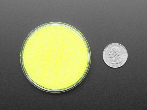 round yellow disc of fluorescent paint.