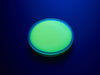 round yellow disc of fluorescent paint.