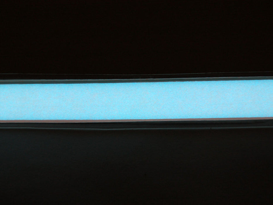 Coil of lit white Electroluminescent Tape Strip 