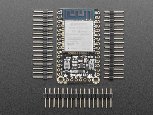 Angled shot of Adafruit HUZZAH32 – ESP32 Breakout Board. 