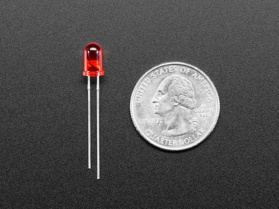 scattered pile of multi colored unlit LEDs 