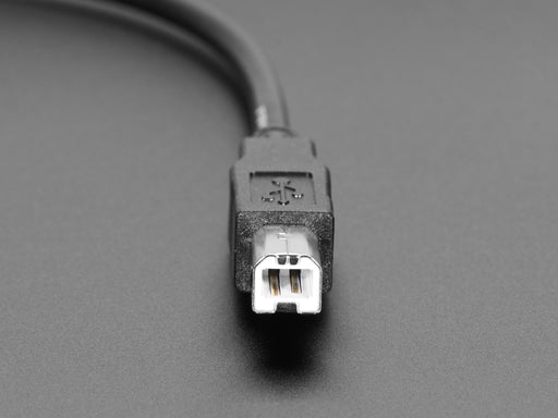 Angled shot of a USB B Round Panel Mount Extension Cable - 30cm.