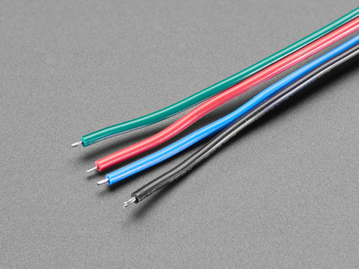 Two hands repeatedly bending and manipulating lit-up flexible silicone tubing.