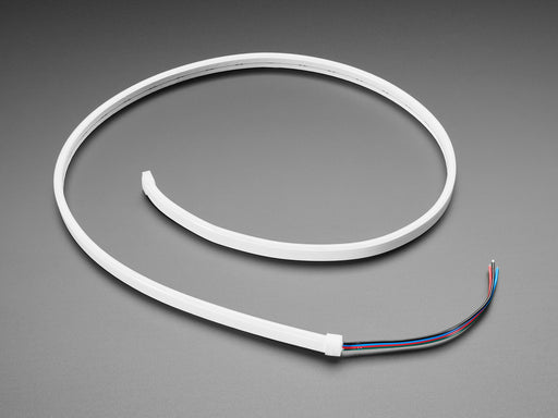 Two hands repeatedly bending and manipulating lit-up flexible silicone tubing.