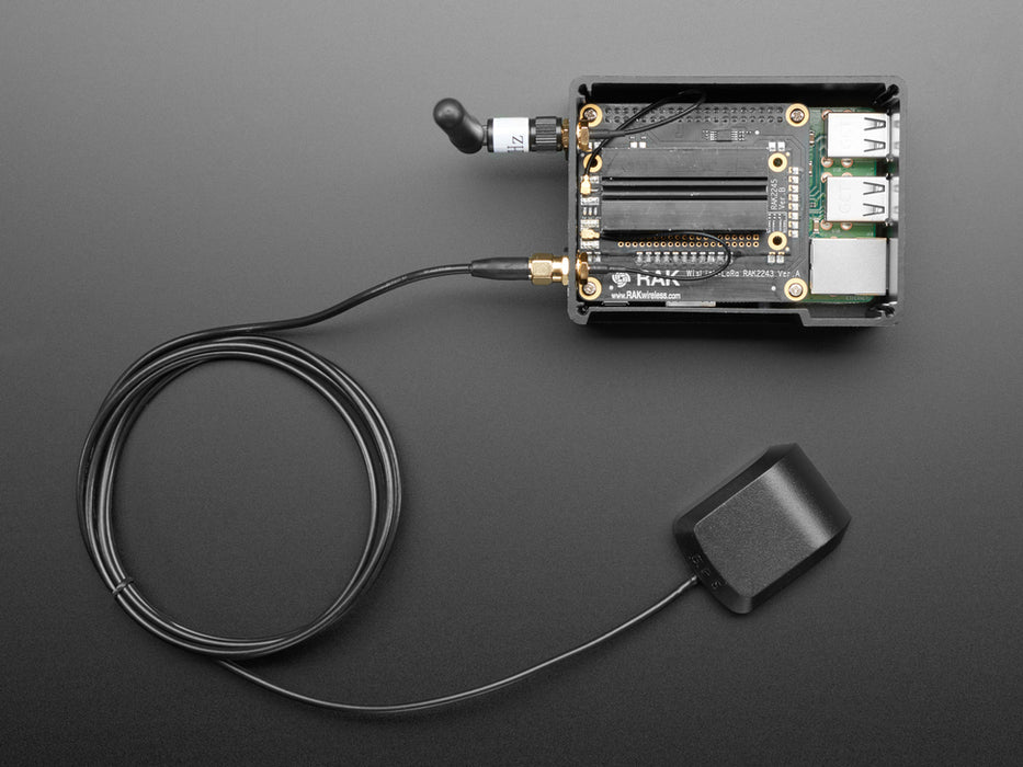 Top down view of 8 Channel LoRa Gateway HAT with LoRa and GPS Antennas. 