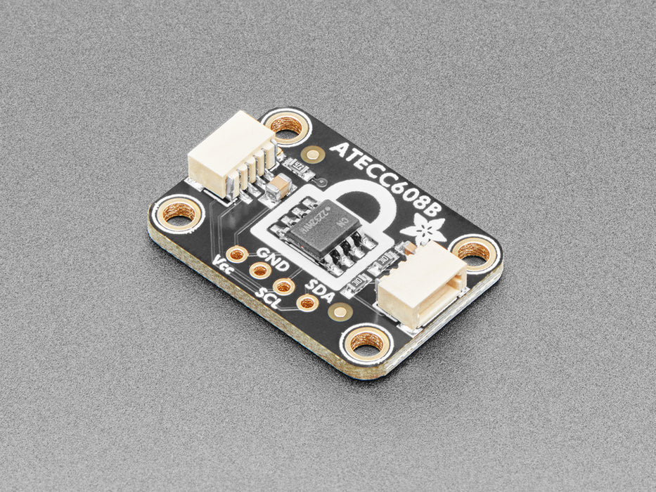 Adafruit ATECC608 Breakout Board  next to clear padlock