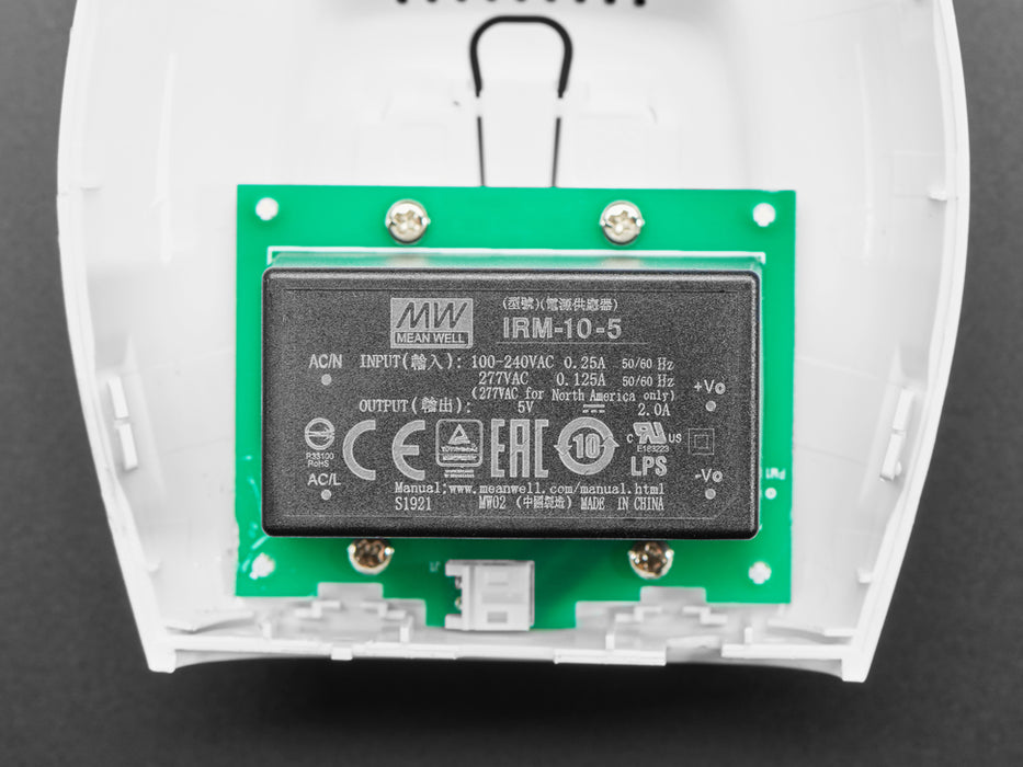 Front view of The Things Indoor LoRaWAN WiFi Gateway - 8 Channel LoRa 900 MHz plugged into a US wall socket. 