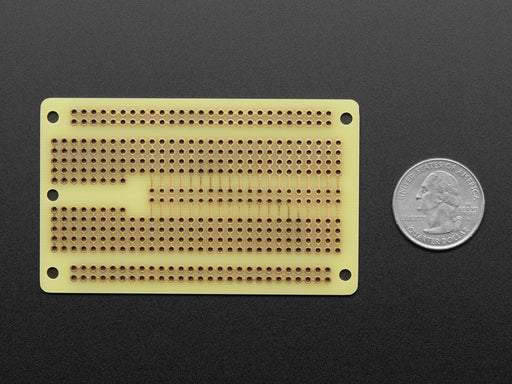 Angled shot of an assembled Adafruit Perma-Proto 40-Pin Raspberry Pi Half-Size PCB with Raspberry Pi computer.