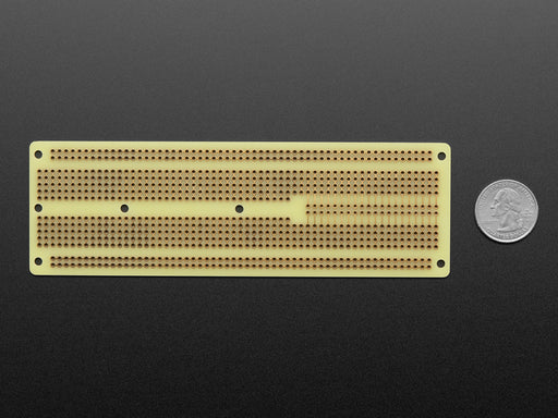 Angled shot of assembled Adafruit Perma-Proto 40-Pin Raspberry Pi Breadboard PCB with a Raspberry Pi 4.