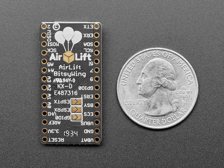 Adafruit AirLift Bitsy Add-On – ESP32 WiFi Co-Processor connected to a half sized white breadboard and a OLED with various wording showing on the display. 