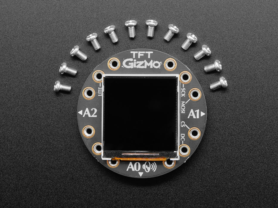 Hand pressing buttons on circuit playground, then turning over to show TFT gizmo display an image of a friendly robot or snake