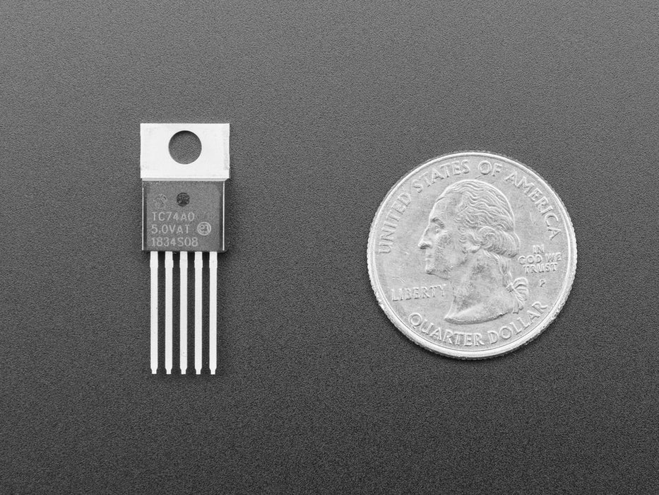  TC74A0 Breadboard Friendly I2C Temperature Sensor plugged into breadboard wired to Feather displaying the temperature