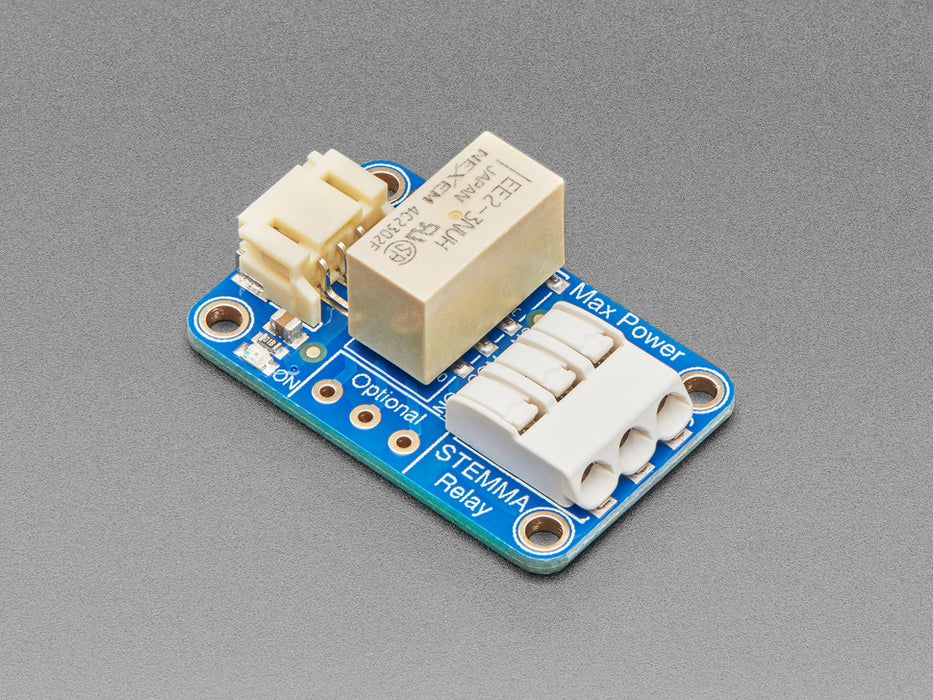 Demo lamp connected to a circuit playground and a Stemma with alligator clips. 