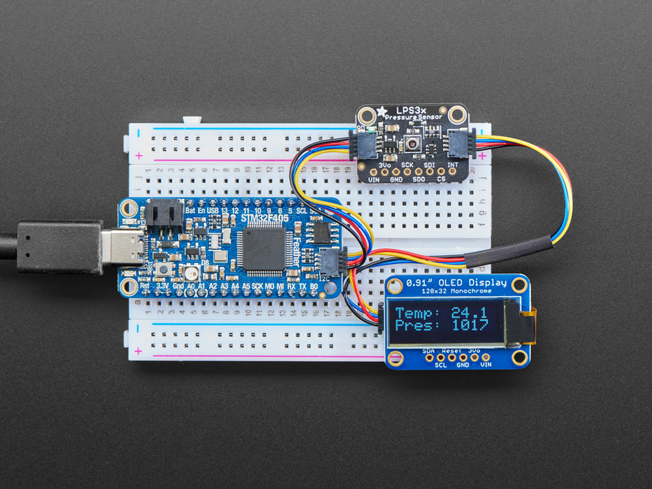 Adafruit LPS33HW Water Resistant Pressure Sensor wired to a Feather and OLED via QT cables