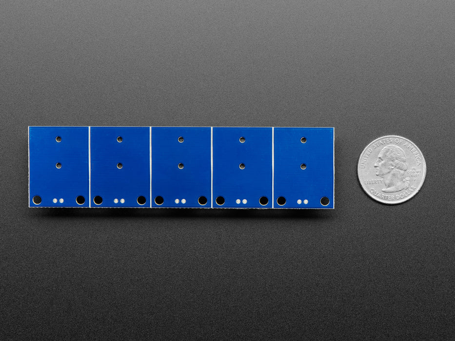 STEMMA Wired Tactile Push-Buttons connected to a half sized white breadboard