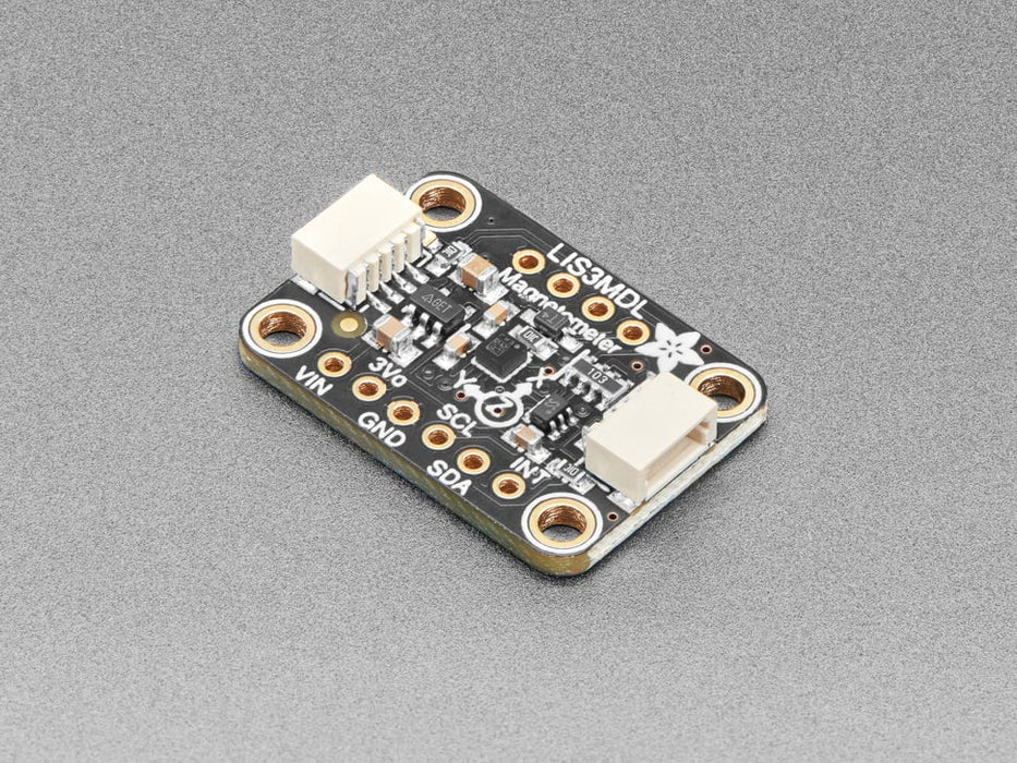 Angled shot of a LIS3MDL Triple-axis Magnetometer breakout.