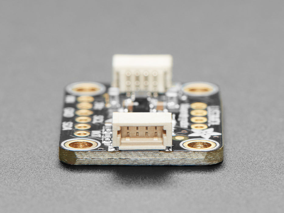 Angled shot of a LIS3MDL Triple-axis Magnetometer breakout.