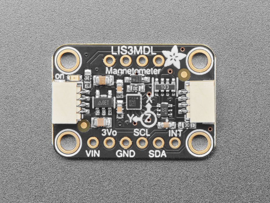 Angled shot of a LIS3MDL Triple-axis Magnetometer breakout.