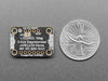 Angled shot of a LIS3MDL Triple-axis Magnetometer breakout.