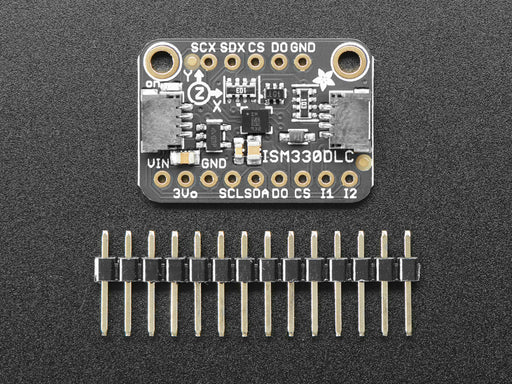 Video of a white hand moving a sensor around that connected to an OLED and a blue rectangular board. 