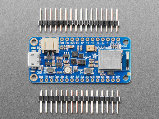 Angled shot of blue, rectangular, microcontroller.