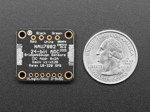 Video of a pair of white hand's trying to bend a strain gauge. The gauge is connected to a breakout board which is also connected to an OLED display on a half-size breadboard. The numbers on the OLED display show high digit numbers.