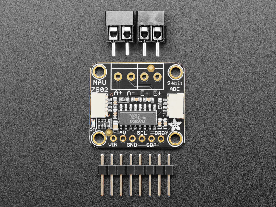 Video of a pair of white hand's trying to bend a strain gauge. The gauge is connected to a breakout board which is also connected to an OLED display on a half-size breadboard. The numbers on the OLED display show high digit numbers.